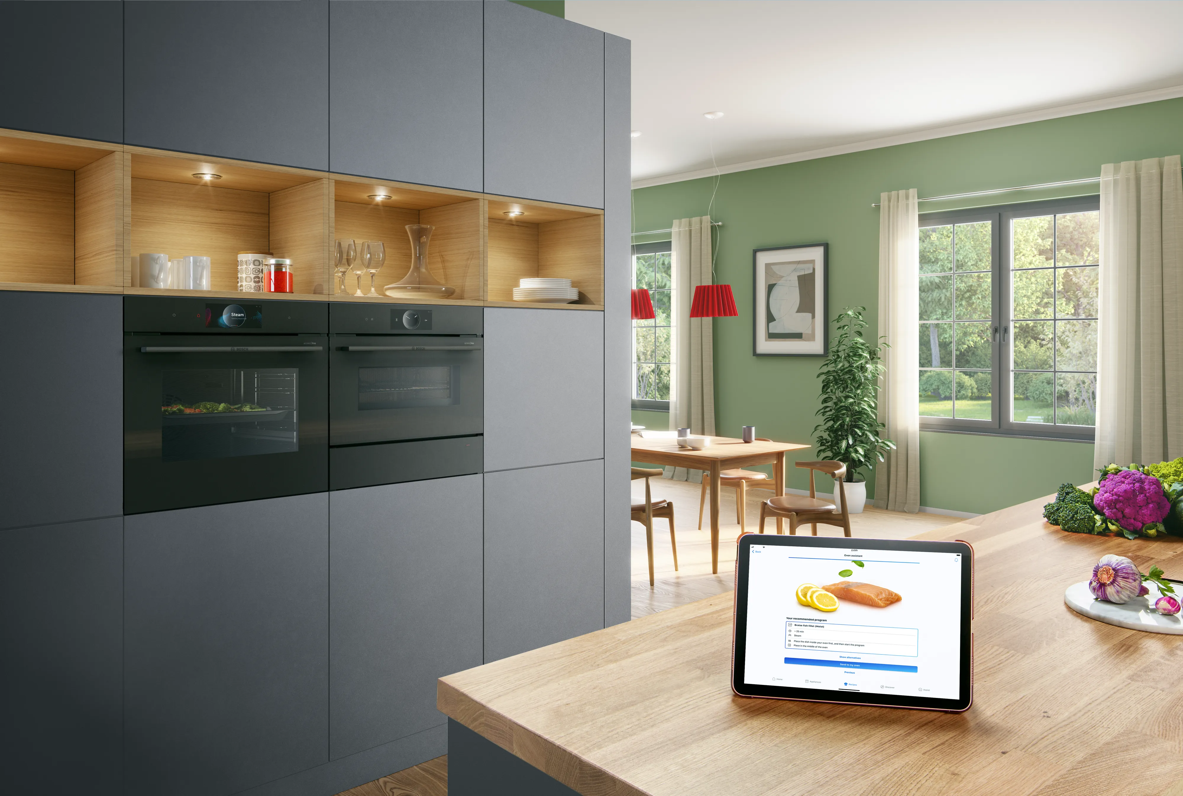 Kitchen setting showcasing two black built in ovens